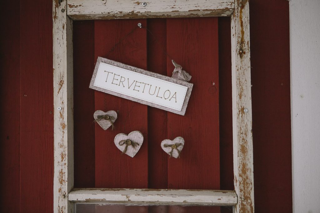 Ronivaaran punainen kehystetty Tervetuloa kyltti